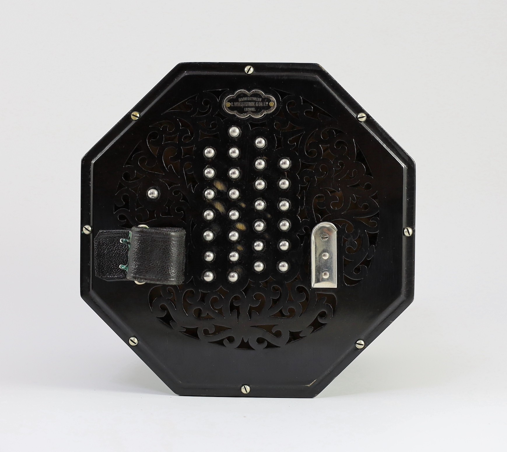 PLEASE NOTE 57 KEYS. A Wheatstone 'English' Model No. 5E 57 key concertina, diameter 17cm, with original leather case